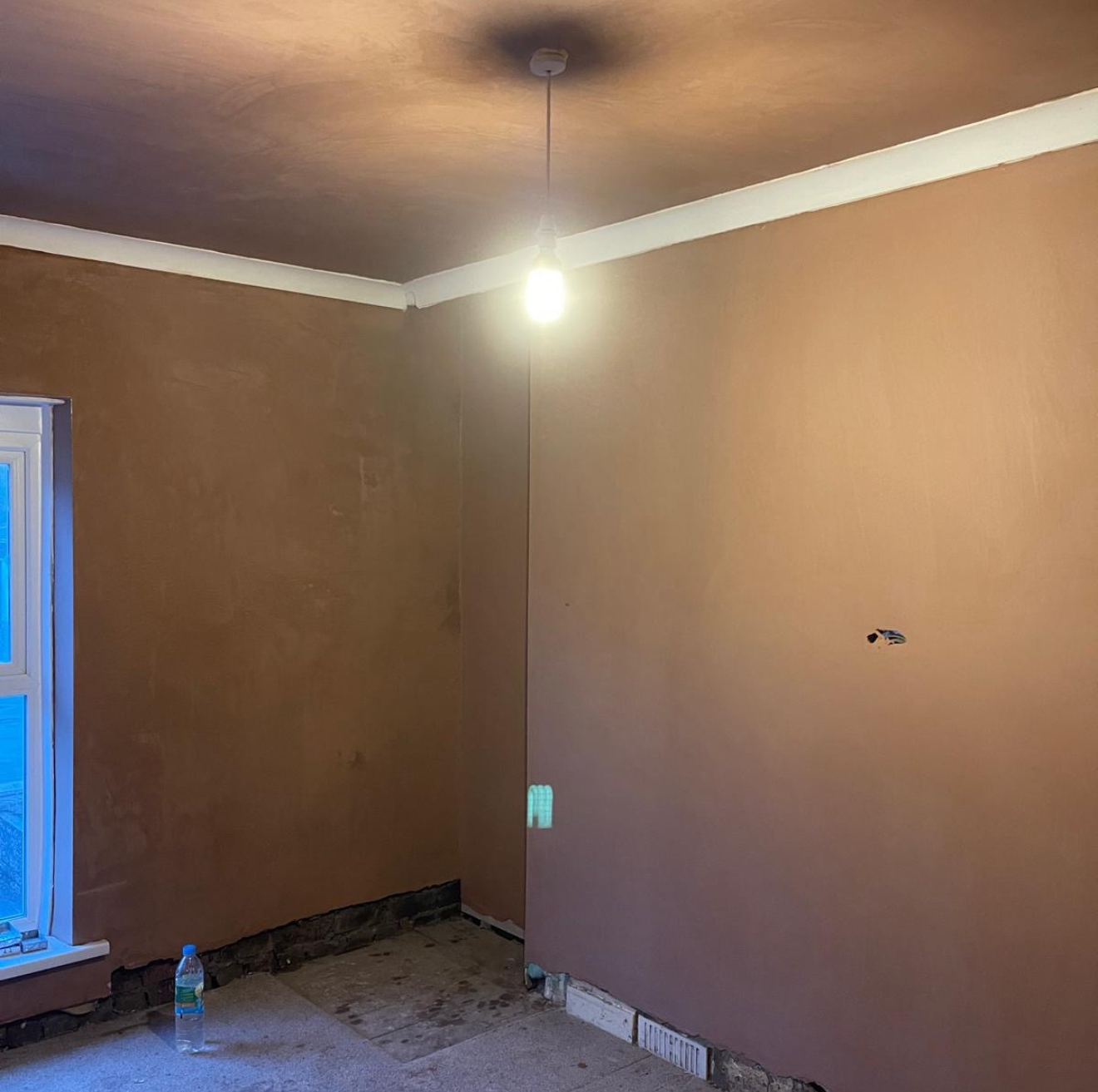 Freshly skimmed bedroom walls