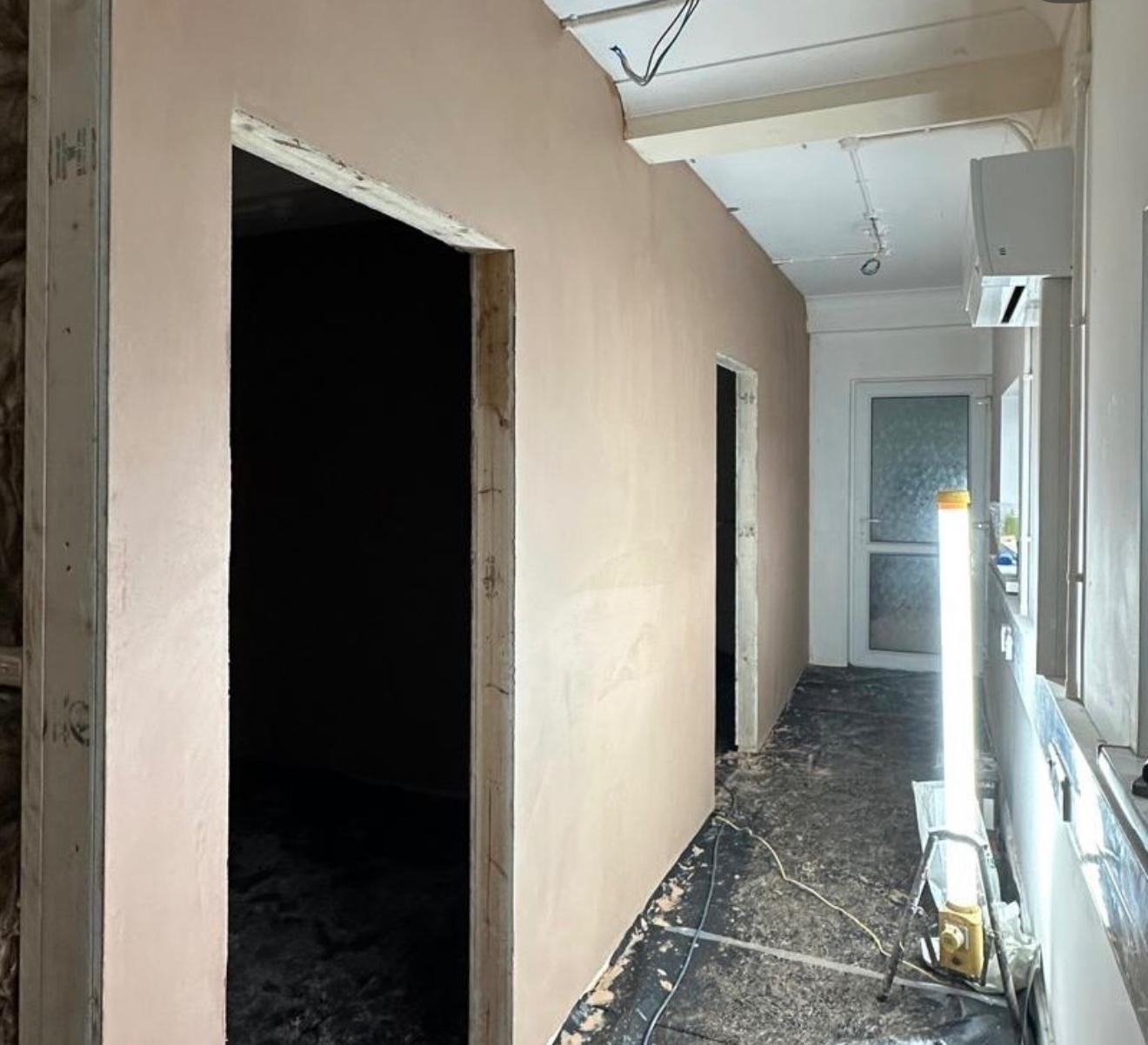 Plastered corridor walls