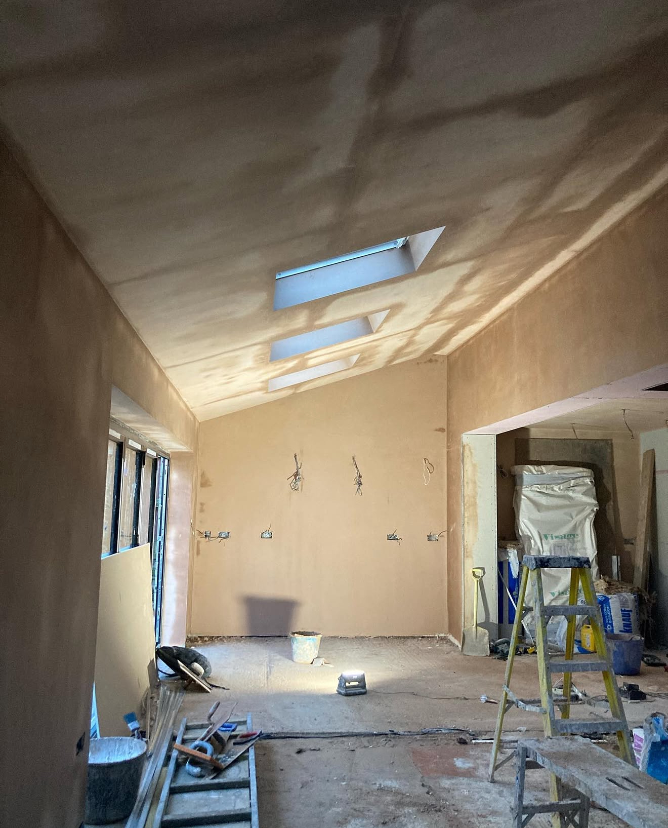 Plastered extension ceiling with roof windows